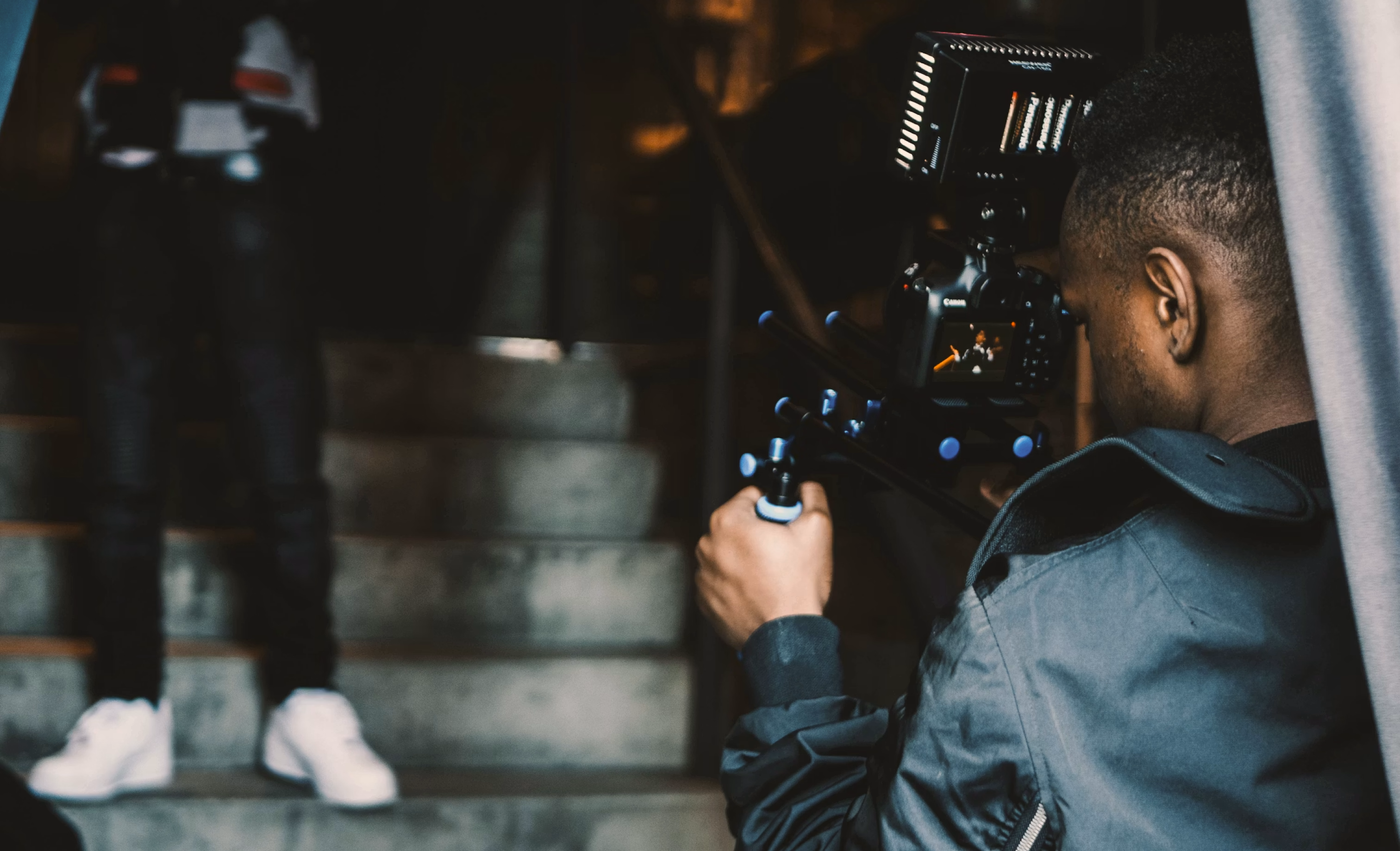 A filmmaker documenting a wedding